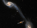 Hubble Inspects A Pair of Space Oddities